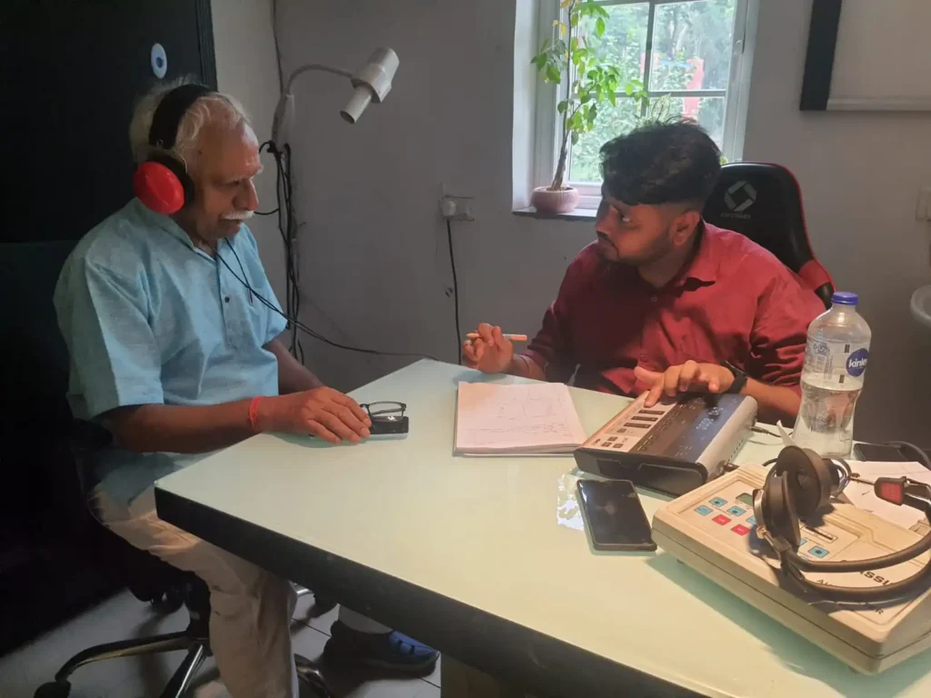 Audiologist conducting audiometry test
